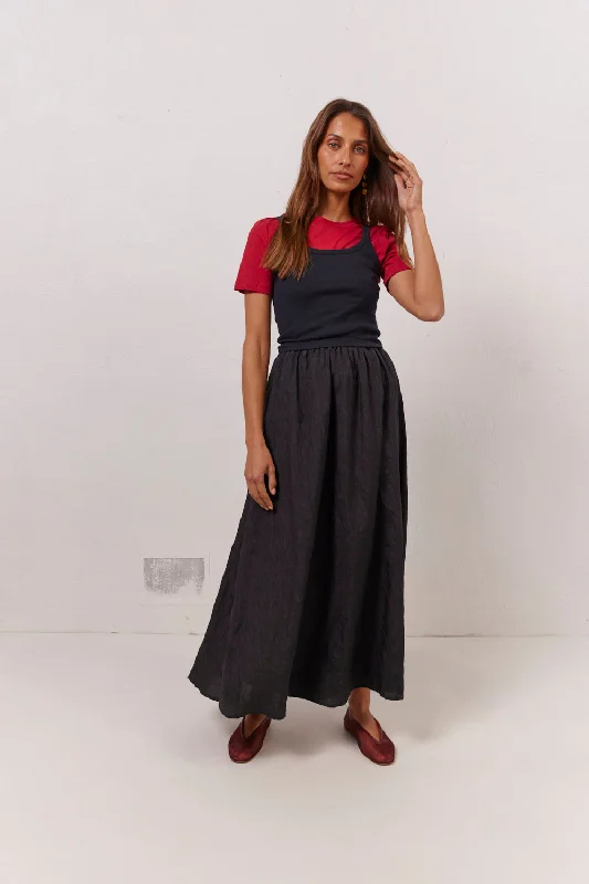 Solara Midi Skirt Black flowy skirt hem